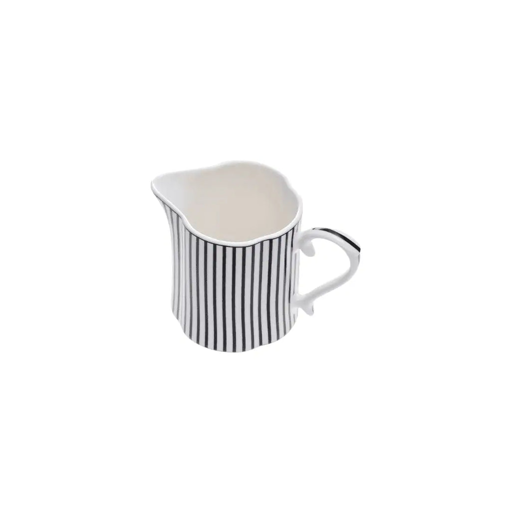 JENNA CLIFFORD – Ivory Noir Creamer