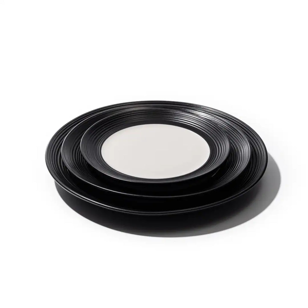 JAN – BlancNoir Charger